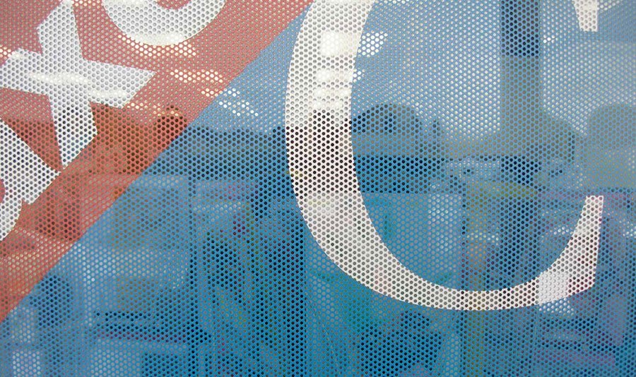 One-way perforated window graphics